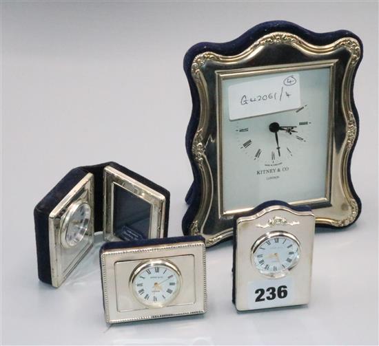 4 silver framed clocks